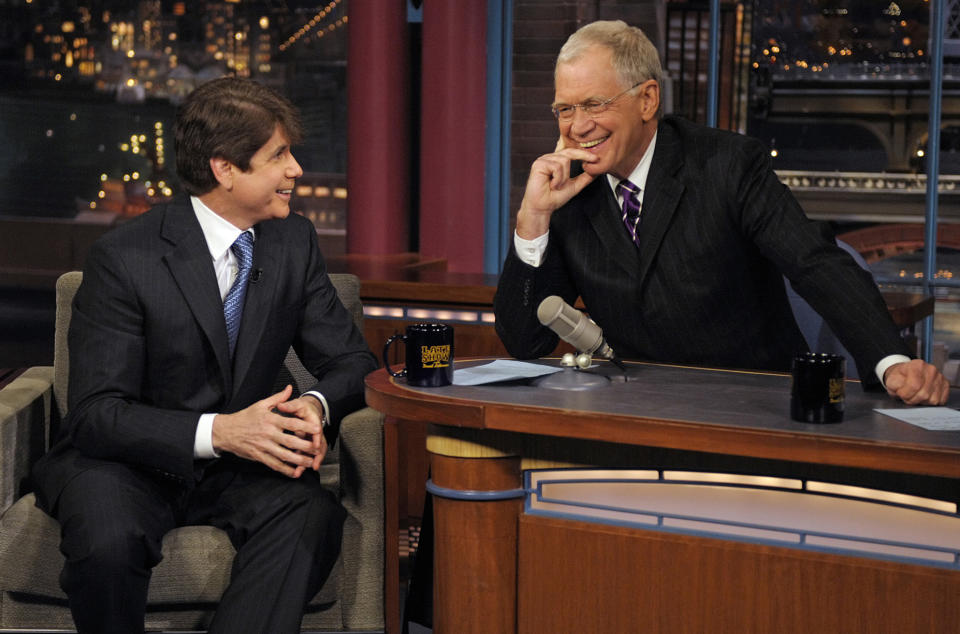 FILE - In this Feb. 3, 2009 file photo released by CBS, former Illinois Gov. Rod Blagojevich, left, visits with host David Letterman on the set of "The Late Show with David Letterman," in New York. Letterman announced his retirement during a taping on Thursday, April 3, 2014. Although no specific date was announced he told the audience that he will leave his desk sometime in 2015. (AP Photo/CBS, Jeffrey R. Staab, File) MANDATORY CREDIT; NO ARCHIVE; NO SALES; NORTH AMERICAN USE ONLY