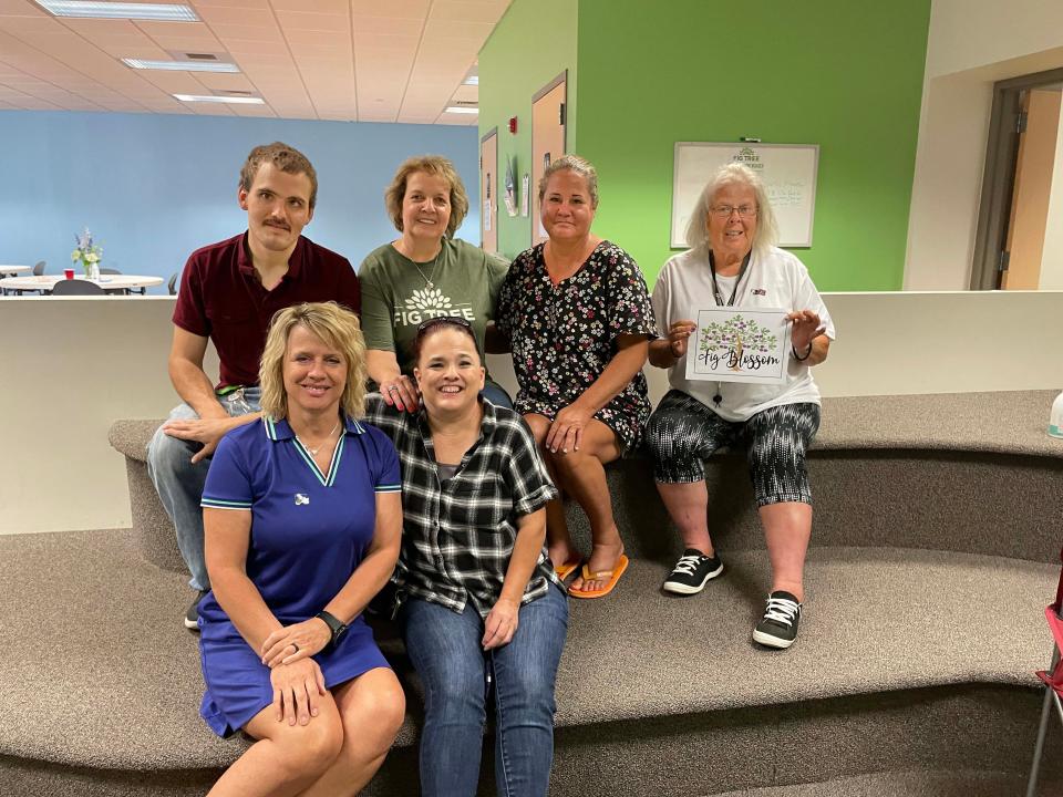 A group of friends formed a family bond and call themselves “The Fig Blossoms” at Fig Tree, a homeless community outreach program sponsored by Cokesbury United Methodist Church, on June 1, 2022. From left, front, are Community Outreach Coordinator Jackie Dehler, Stephanie McBrayer; back, Aaron McBrayer, Cokesbury employee Emina Muftic, Melanie Treece, Trish Davis.