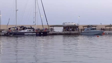 A still image from a video footage shows a migrant rescue boat "Alex", after the vessel docked at the port of Lampedusa in defiance of a ban on entering Italian waters, in Lampedusa