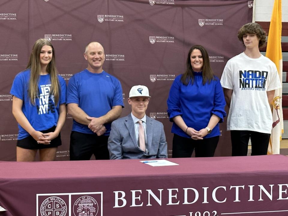 Kaden Tuten of Benedictine, with his family, as he signed to play baseball at Brevard College Wednesday.