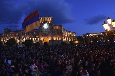 People celebrate after Armenian Prime Minister Serzh Sarksyan resigned following almost two weeks of mass street protests, in central Yerevan, Armenia April 23, 2018. REUTERS/Hayk Baghdasaryan/Photolure