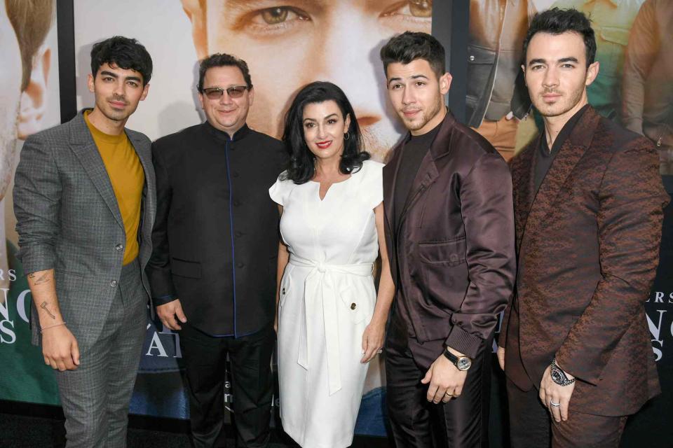 <p>Kevin Winter/Getty</p>  Joe Jonas, Paul Kevin Jonas Sr., Denise Miller-Jonas, Nick Jonas, and Kevin Jonas attend the Premiere of Amazon Prime Video