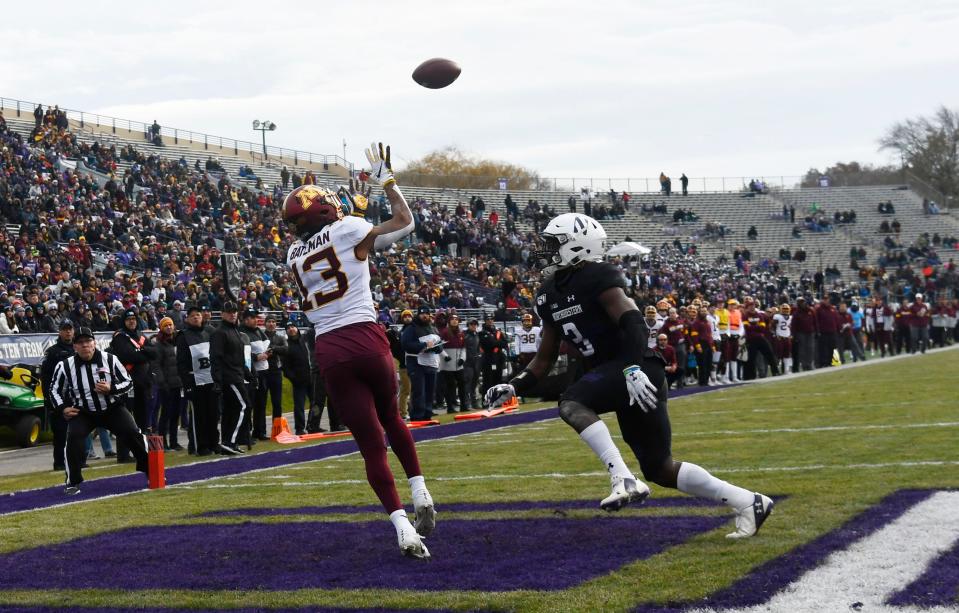 Nov 23, 2019; Evanston, IL, USA; Minnesota Golden Gophers wide receiver Rashod Bateman (13) catches a touchdown as Northwestern Wildcats defensive back Trae Williams (3) defends him during the second half at Ryan Field. Mandatory Credit: David Banks-USA TODAY Sports