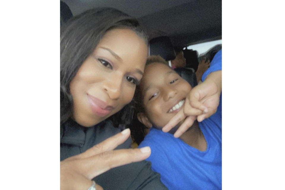 Ahmir Jolliff, who was killed in a school shooting on Thursday, Jan. 4, 2024, in Perry, Iowa, poses for a selfie with his mother, Erica Jolliff, in this undated photo. He was 11 years old and a sixth grader when he died. Authorities say a 17-year-old opened fire in the cafeteria of Perry High School before classes began for the day, killing Ahmir and wounding seven other people. The teenage suspect died of a self-inflicted gunshot wound. (Photo courtesy of Erica Jolliff)