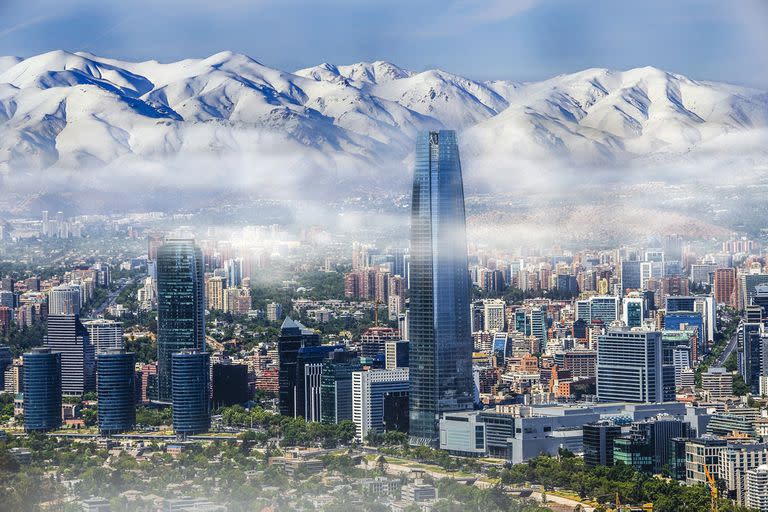 Aerial view on skyscrapers of Financial District of Santiago, capital of Chile under early morning fog