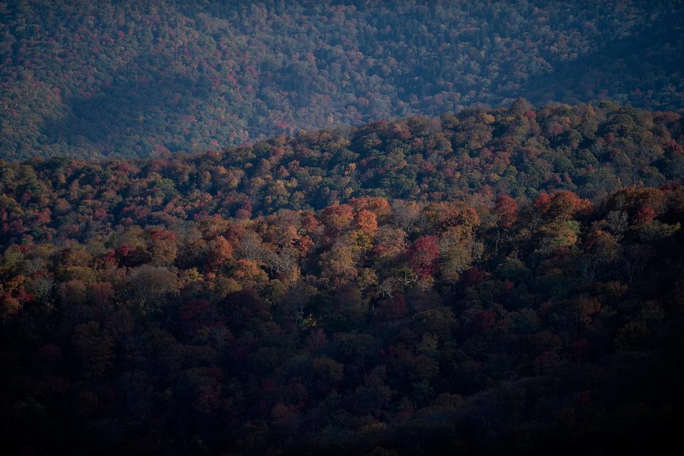 The sun rises over the mountains on the Blue Ridge Parkway, October 19, 2023.