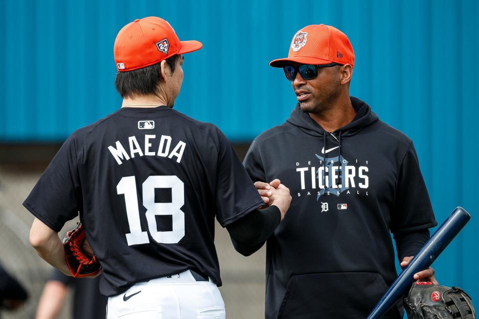 Detroit Tigers pitcher Kenta Maeda talks to bench coach George Lombard during spring training at TigerTown in Lakeland, Fla. on Thursday, Feb. 15, 2024.
