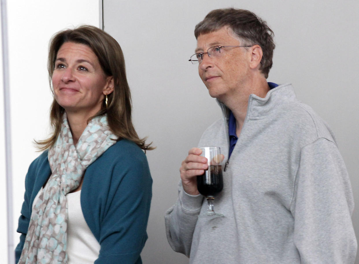 Bill and Melinda Gates listen to remarks during the opening reception of Bill and Melinda Gates Foundation campus in Seattle, Washington, June 2, 2011. REUTERS/Marcus Donner