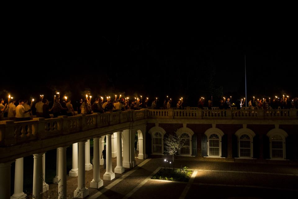 <p>Neo-Nazis, Alt-Right, and White Supremacists march through the University of Virginia Campus with torches in Charlottesville, Va., on Aug. 11, 2017. (Photo: Samuel Corum/Anadolu Agency/Getty Images) </p>