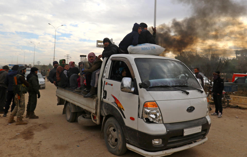 Evacuees from rebel-held eastern Aleppo, arrive to an area on the western edge of Aleppo city which is held by insurgents, Syria December 16, 2016. REUTERS/Ammar Abdullah