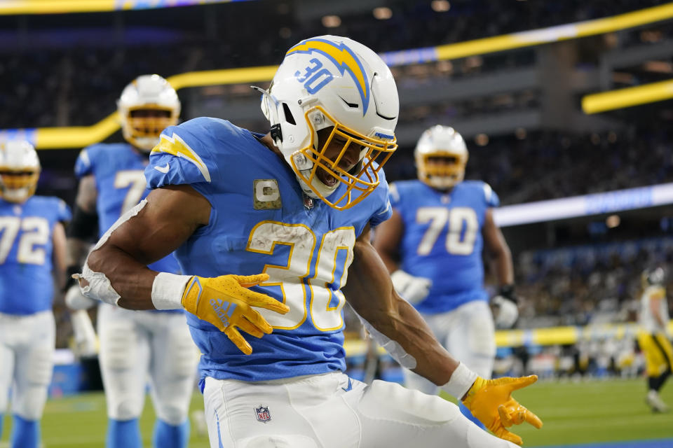 Los Angeles Chargers running back Austin Ekeler reacts after scoring a touchdown during the second half of an NFL football game against the Pittsburgh Steelers, Sunday, Nov. 21, 2021, in Inglewood, Calif. (AP Photo/Ashley Landis)
