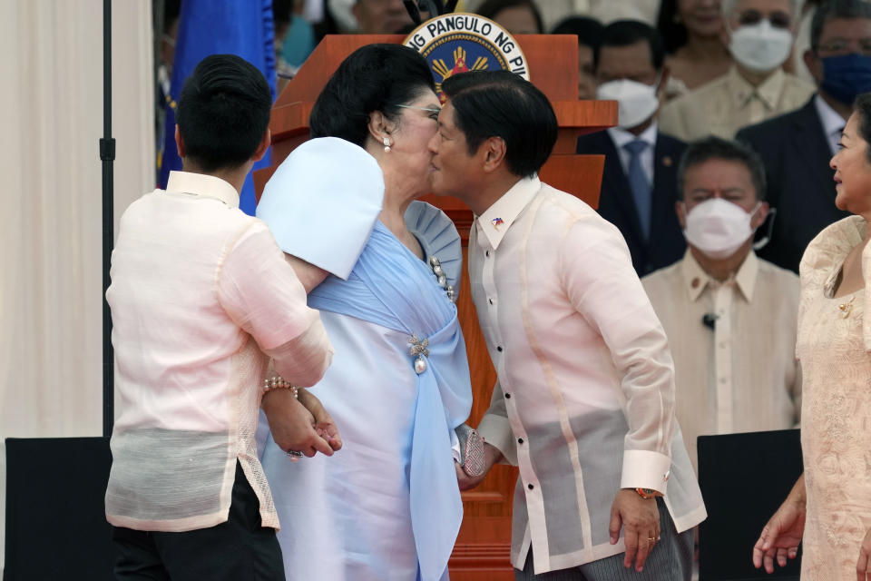 President-elect Ferdinand "Bongbong" Marcos Jr., left top, and his wife Maria Louise Marcos arrive for the inauguration ceremony at National Museum on Thursday, June 30, 2022 in Manila, Philippines. Marcos was sworn in as the country's 17th president. (AP Photo/Aaron Favila)