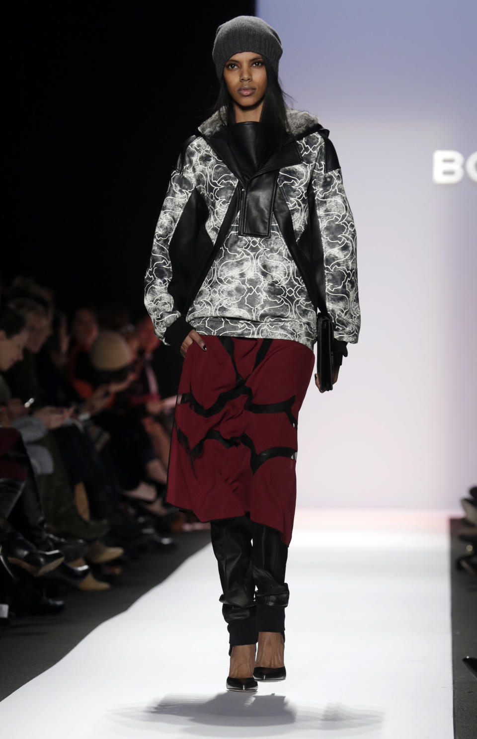 The BCBG Max Azria Fall 2013 collection is modeled during Fashion Week in New York on Thursday, Feb. 7, 2013. (AP Photo/Richard Drew)