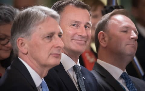 Philip Hammond, Jeremy Hunt and NHS chief executive Simon Stevens - Credit: Getty Images/Getty Images