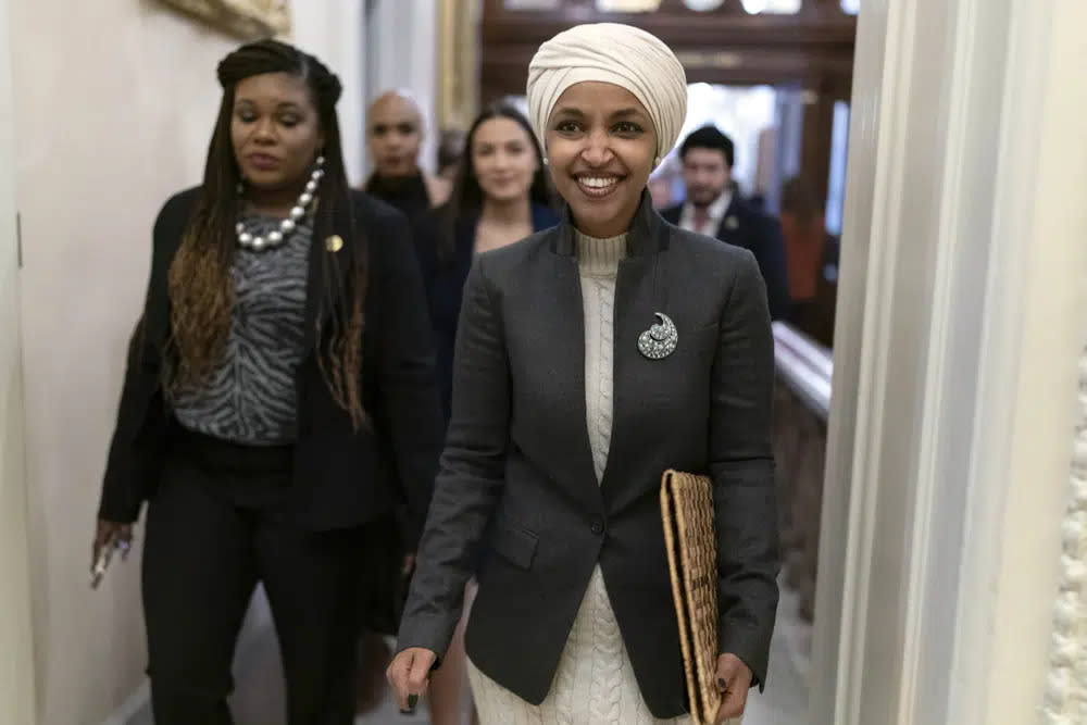 Rep. Ilhan Omar, D-Minn., talks to reporters as she leaves the House chamber at the Capitol in Washington, Thursday, Feb. 2, 2023. (AP Photo/Jose Luis Magana, File)