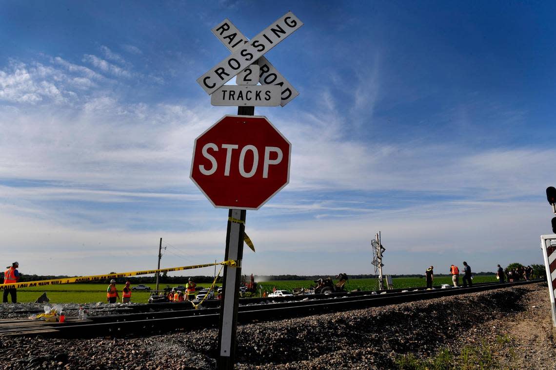 Several cars of an Amtrak train traveling from Los Angeles to Chicago derailed Monday afternoon after it struck a dump truck at a crossing in northern Missouri, Amtrak announced. More than 200 people were on board the train at the time of the crash, which was first reported about 12:43 p.m. near Mendon, Missouri, according to the Missouri State Highway Patrol. Three people were killed in the crash, the patrol said, including two people on the train and one person in the dump truck. This picture is looking east from the intersection.