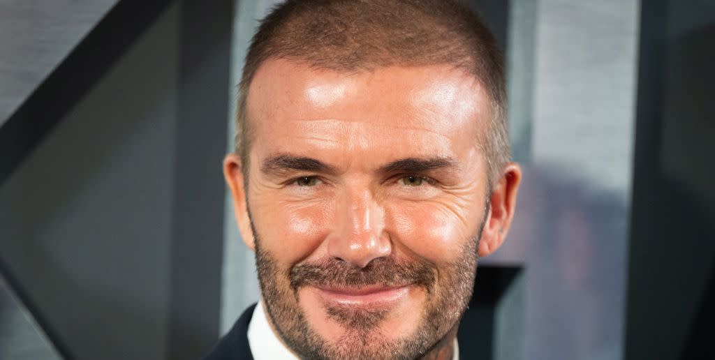 david beckham smiling at the camera