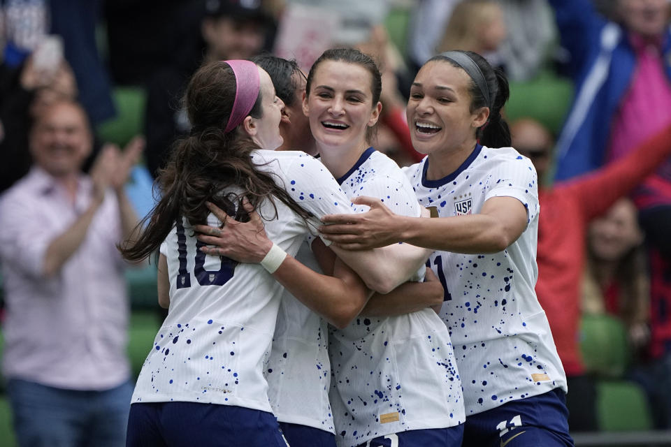 United States defender Emily Fox, center, celebrates with teammates after scoring against Ireland during the first half of an international friendly soccer match in Austin, Texas, Saturday, April 8, 2023. (AP Photo/Eric Gay)