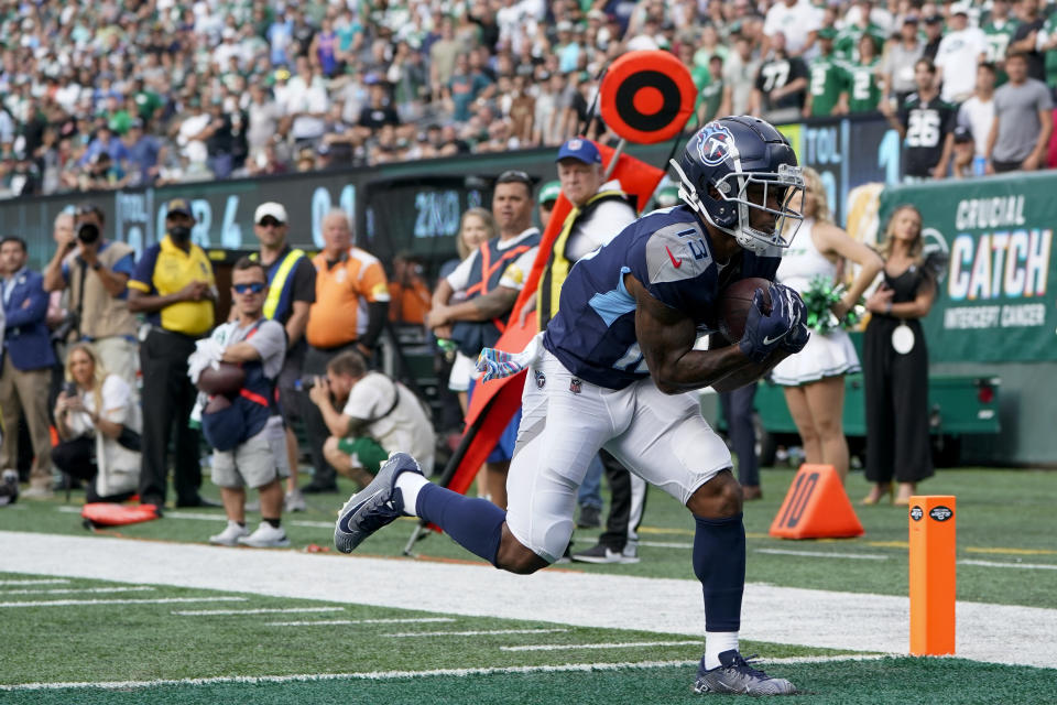 Tennessee Titans wide receiver Cameron Batson runs in a touchdown during the second half of an NFL football game against the New York Jets, Sunday, Oct. 3, 2021, in East Rutherford, N.J. (AP Photo/Seth Wenig)