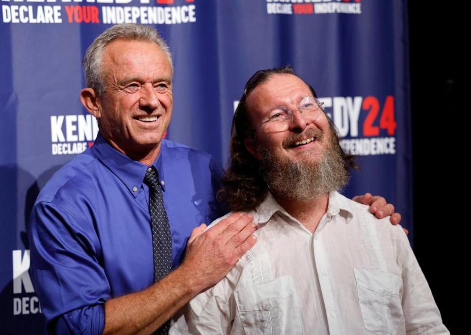 Chuck Muldoon, at right, a supporter of presidential candidate Robert F. Kennedy Jr., poses for a selfie as Kennedy Jr. hits the campaign trail to celebrate his launch of an independent run for President of the United States of America at the Adrienne Arsht Center for the Performing Arts in Miami on Thursday, October 12, 2023. Al Diaz/adiaz@miamiherald.com