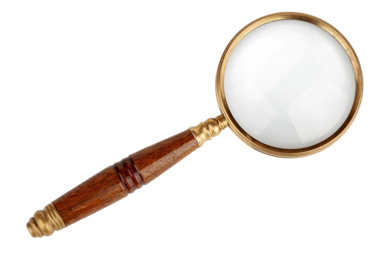 Magnifying glass with a brown wooden handle