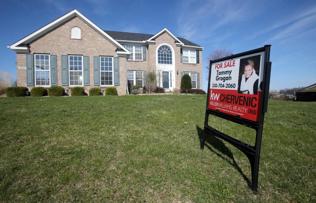 A house is shown with a sign that reads "for sale" in Canton on Tuesday, April 12, 2022.