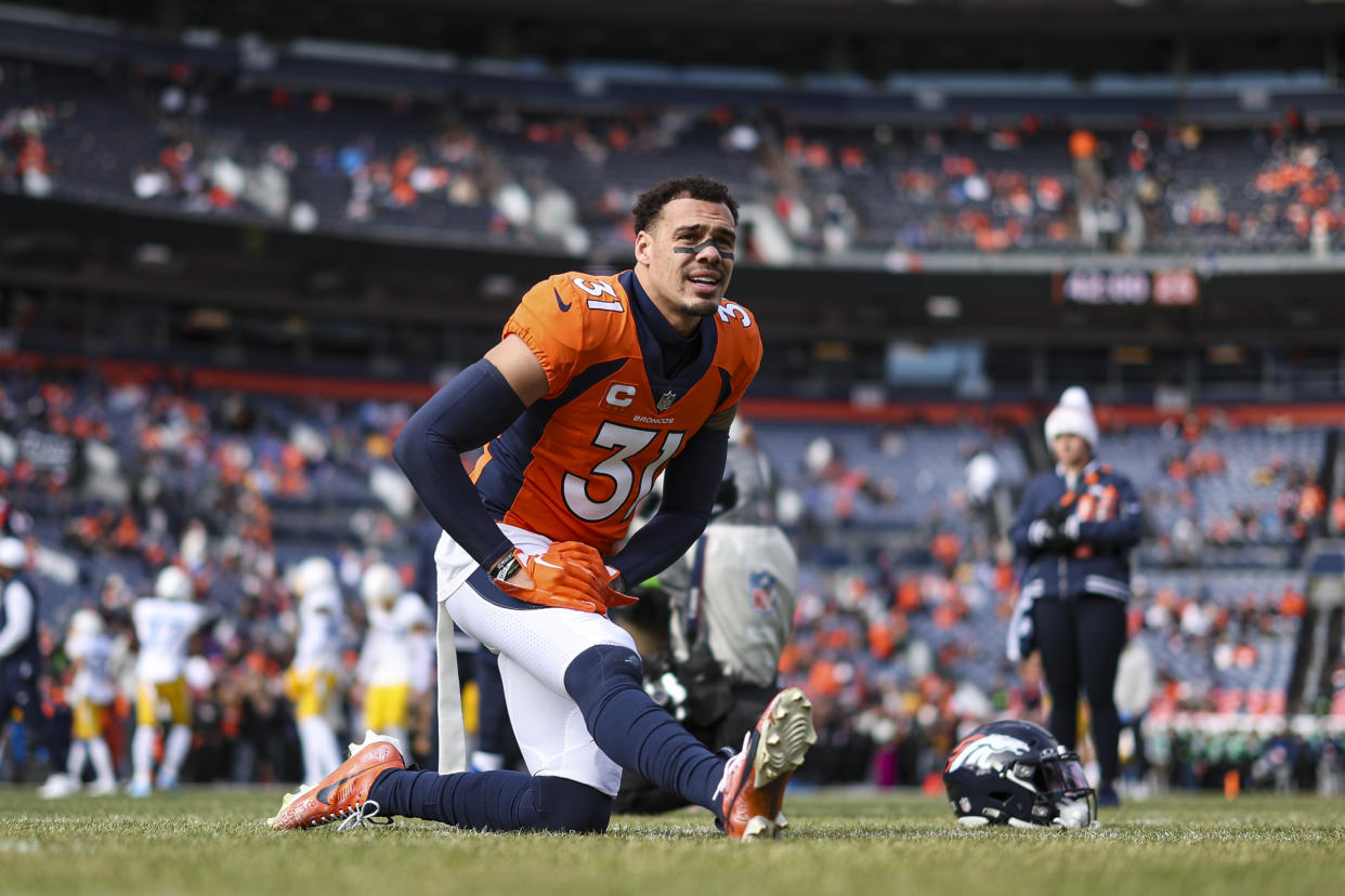 DENVER, CO - DECEMBER 31: Justin Simmons #31 of the Denver Broncos warms up prior to an NFL football game against the Los Angeles Chargers at Empower Field at Mile High on December 31, 2023 in Denver, Colorado. (Photo by Perry Knotts/Getty Images)