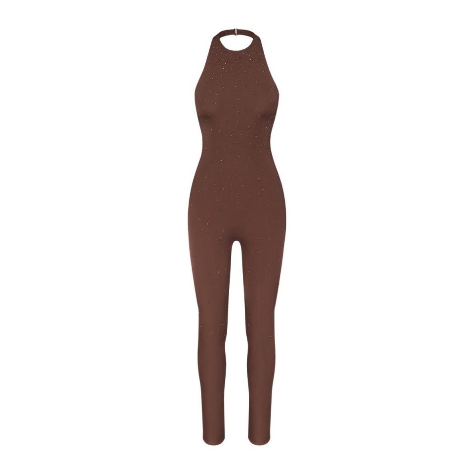 <p><a href="https://go.redirectingat.com?id=74968X1596630&url=https%3A%2F%2Fskims.com%2Fproducts%2Fswarovski-x-skims-jelly-sheer-halter-catsuit-cocoa&sref=https%3A%2F%2F" rel="nofollow noopener" target="_blank" data-ylk="slk:Shop Now;elm:context_link;itc:0;sec:content-canvas" class="link ">Shop Now</a></p><p>Jelly transparent Halter Catsuit</p><p>skims.com</p><p>$198.00</p>