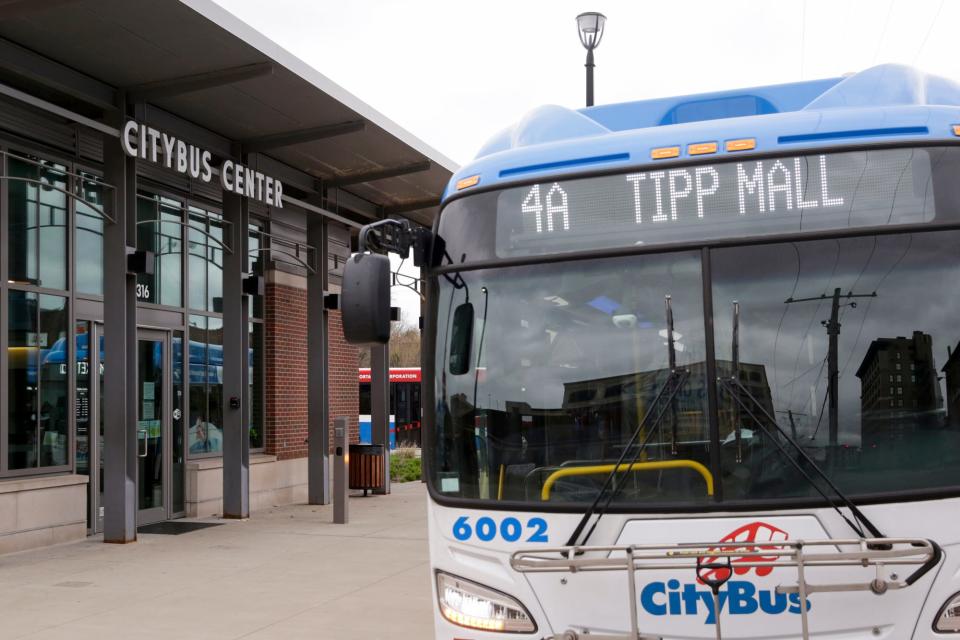 A bus idles outside the CityBus Center on Third Street, Monday, April 13, 2020 in Lafayette.