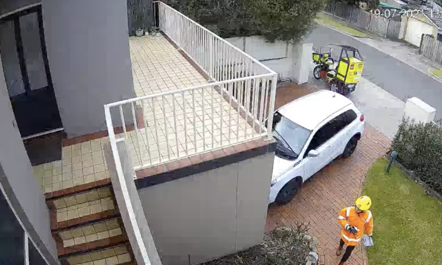 Australia Post delivery driver caught throwing parcel on camera