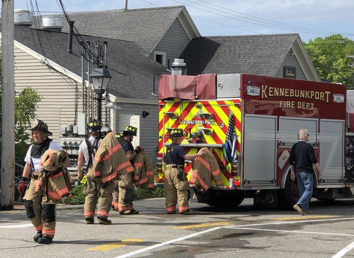 Firefighters get ready to leave Hurricane Restaurant in Kennebunkport, Maine, after putting out a fire there on Thursday, May 26, 2022.