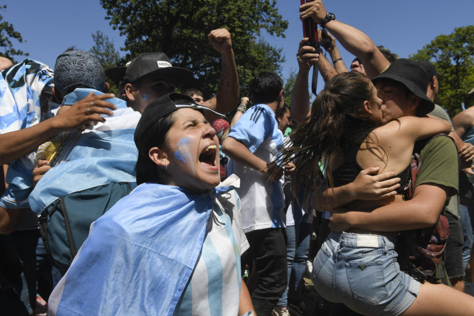 Argentine soccer fans celebrate their team's World Cup victory over France, in Buenos Aires, Argentina, Sunday, Dec. 18, 2022. (AP Photo/Gustavo Garello)