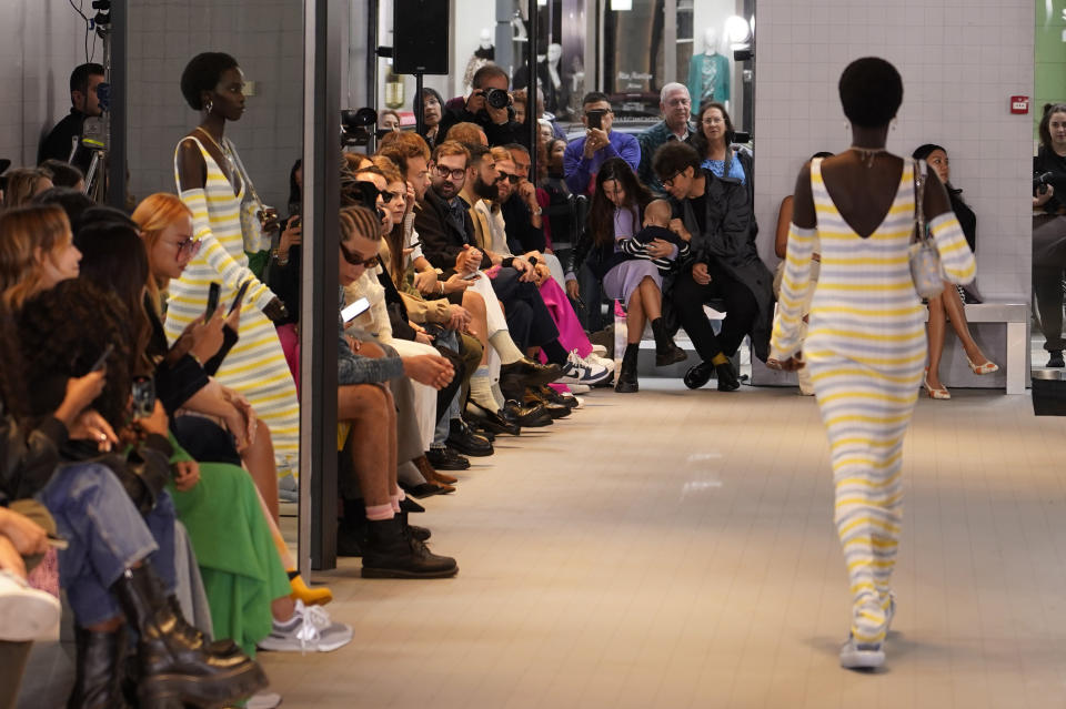 A model wears a creation as part of the Benetton women's Spring Summer 2023 collection presented in Milan, Italy, Sunday, Sept. 25, 2022. (AP Photo/Alberto Pezzali)