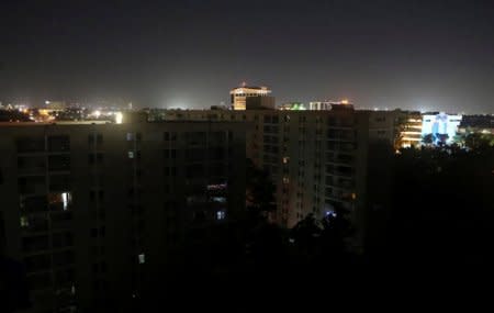 FILE PHOTO: A general view shows buildings after Puerto Rico Electric Power Authority (PREPA), the island's power company, said on Wednesday that a major power line failure in southern Puerto Rico cut electricity to almost all customers, in San Juan, Puerto Rico April 18, 2018. REUTERS/Gabriel Lopez Albarran