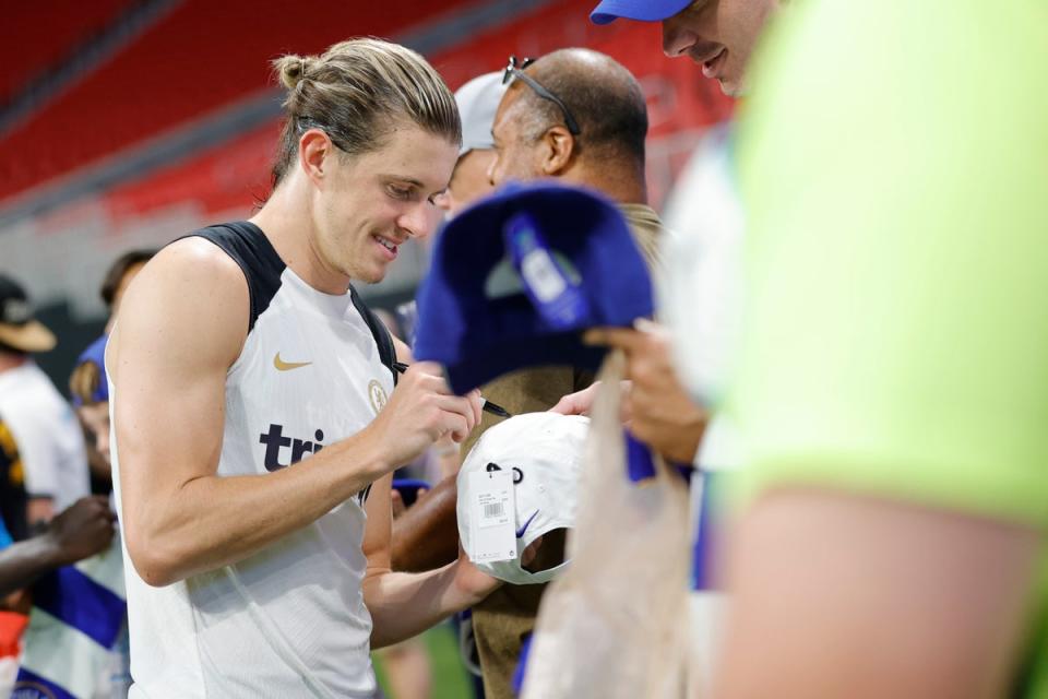 Conor Gallagher of Chelsea  signs autographs for fans (Getty Images for Premier League)