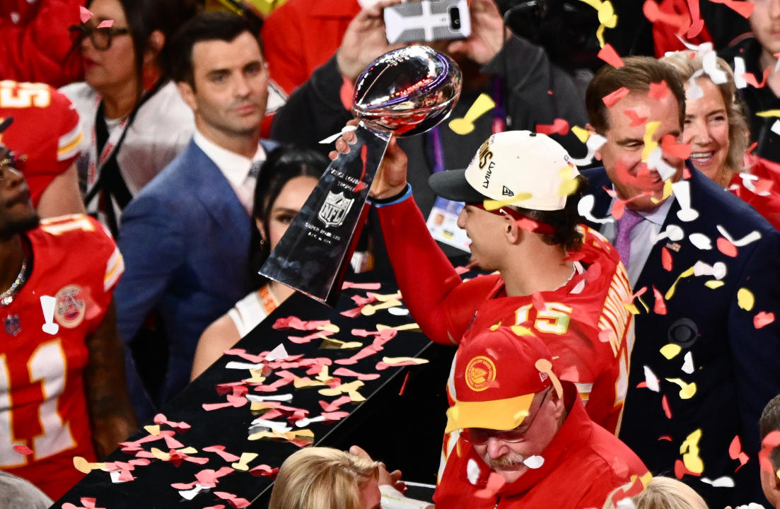 Kansas City Chiefs' quarterback #15 Patrick Mahomes holds the trophy after winning Super Bowl LVIII against the San Francisco 49ers at Allegiant Stadium in Las Vegas, Nevada, February 11, 2024. (Photo by Patrick T. Fallon / AFP) (Photo by PATRICK T. FALLON/AFP via Getty Images)
