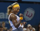 Serena Williams of the U.S. reacts as she defeats Maria Sharapova of Russia during their women's singles semi-finals match at the Brisbane International tennis tournament in Brisbane, January 3, 2014. REUTERS/Jason Reed