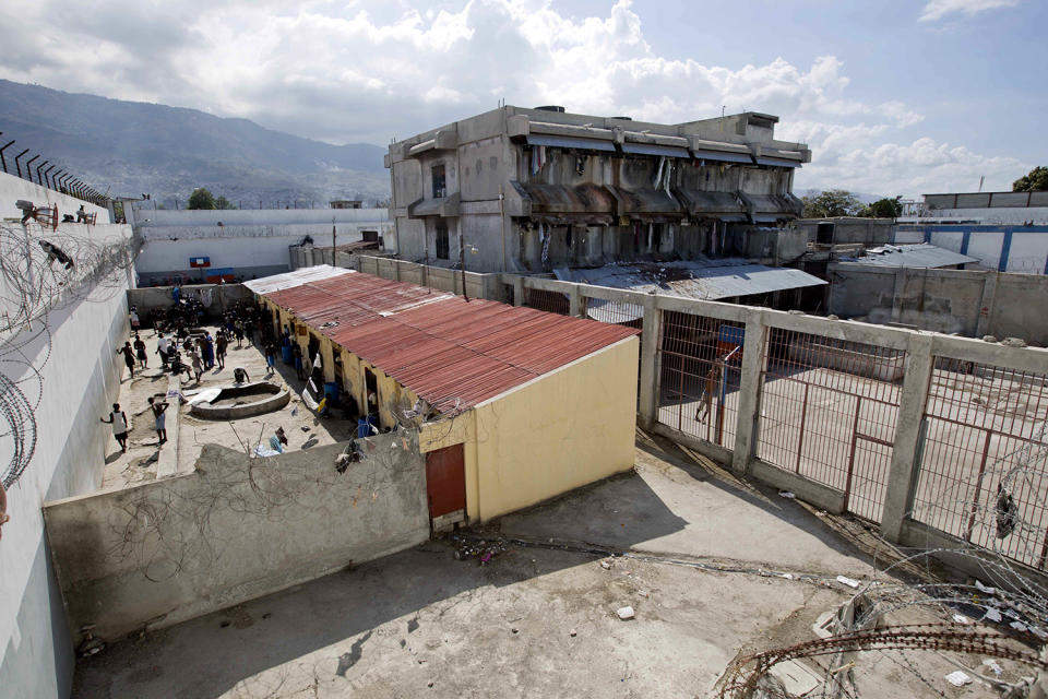 <p>Prisoners in a courtyard at the National Penitentiary in downtown Port-au-Prince, Haiti, Feb. 13, 2017. Haiti’s penal system is by far the globe’s most congested, with a staggering 454 percent occupancy level, according to the most recent ranking by the University of London’s Institute for Criminal Policy Research. (Photo: Dieu Nalio Chery/AP) </p>