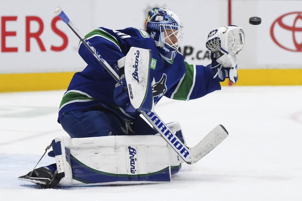Vancouver Canucks goalie Collin Delia allows a goal to Colorado Avalanche's Samuel Girard during the second period of an NHL hockey game Thursday, Jan. 5, 2023, in Vancouver, British Columbia. (Darryl Dyck/The Canadian Press via AP)