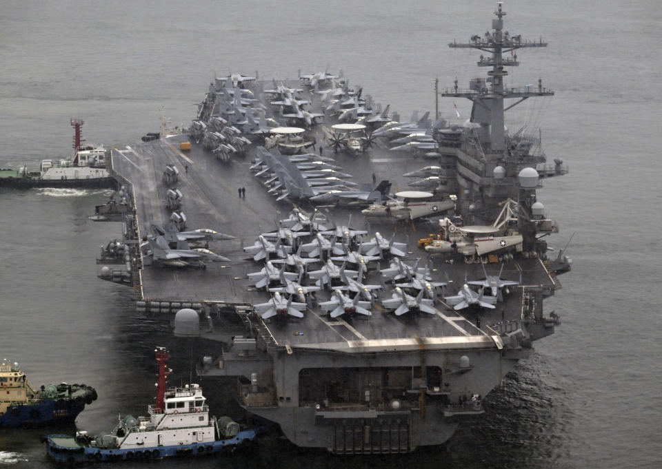 The Theodore Roosevelt (CVN 71), a nuclear-powered aircraft carrier, is anchored in Busan, South Korea, Saturday, June 22, 2024. (Song Kyung-Seok/Pool Photo via AP)