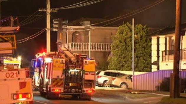 Firefighters at the scene of the deadly fire. Photo: 7 News