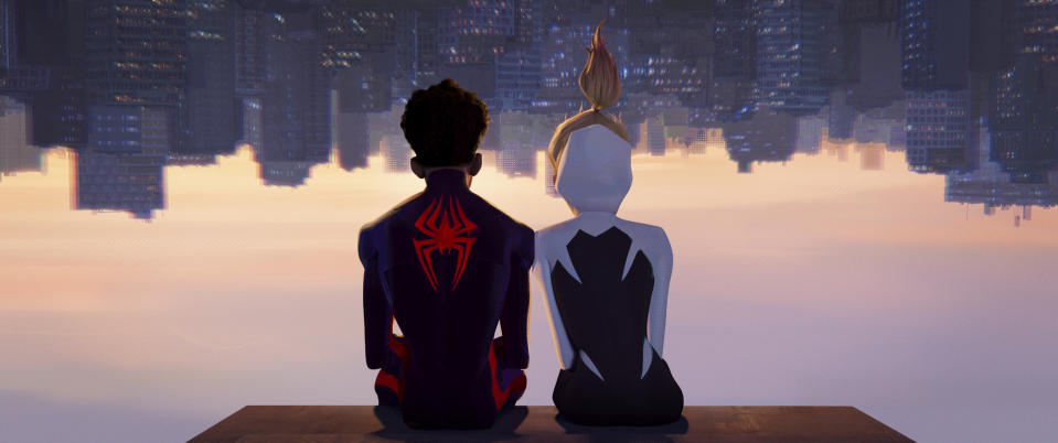 This image released by Sony Pictures Animation shows Miles Morales as Spider-Man, voiced by Shameik Moore, left, and and Spider-Gwen, voiced by Hailee Steinfeld, in a scene from Columbia Pictures and Sony Pictures Animation's "Spider-Man: Across the Spider-Verse." (Sony Pictures Animation via AP)