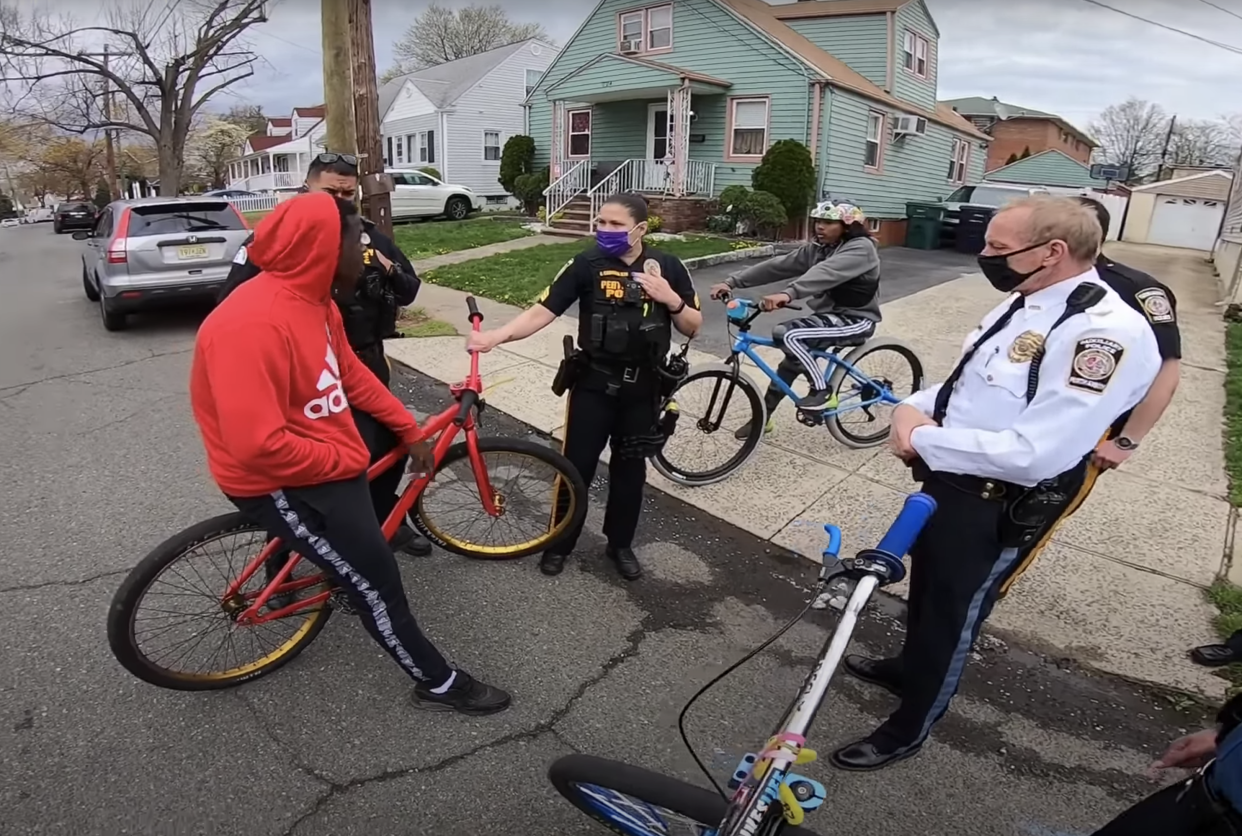 <p>Police arrested a Black teenager and confiscated four of his friends’ bicycles in Perth Amboy, New Jersey</p> (YouTube/Christian Orozco)