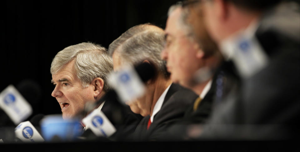 NCAA President Mark Emmert answers a question at a news conference Sunday, April 6, 2014, in Arlington, Texas. (AP Photo/Tony Gutierrez)