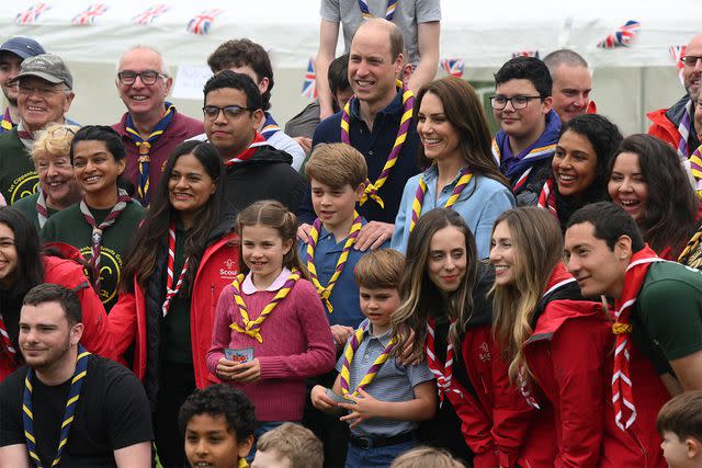 <p>Daniel Leal - WPA Pool/Getty</p> Princess Charlotte, Prince George, Prince William, Prince Louis and Kate Middleton (center) at a Big Help out event with the 3rd Upton Scouts Hut in Slough on May 8, 2023.