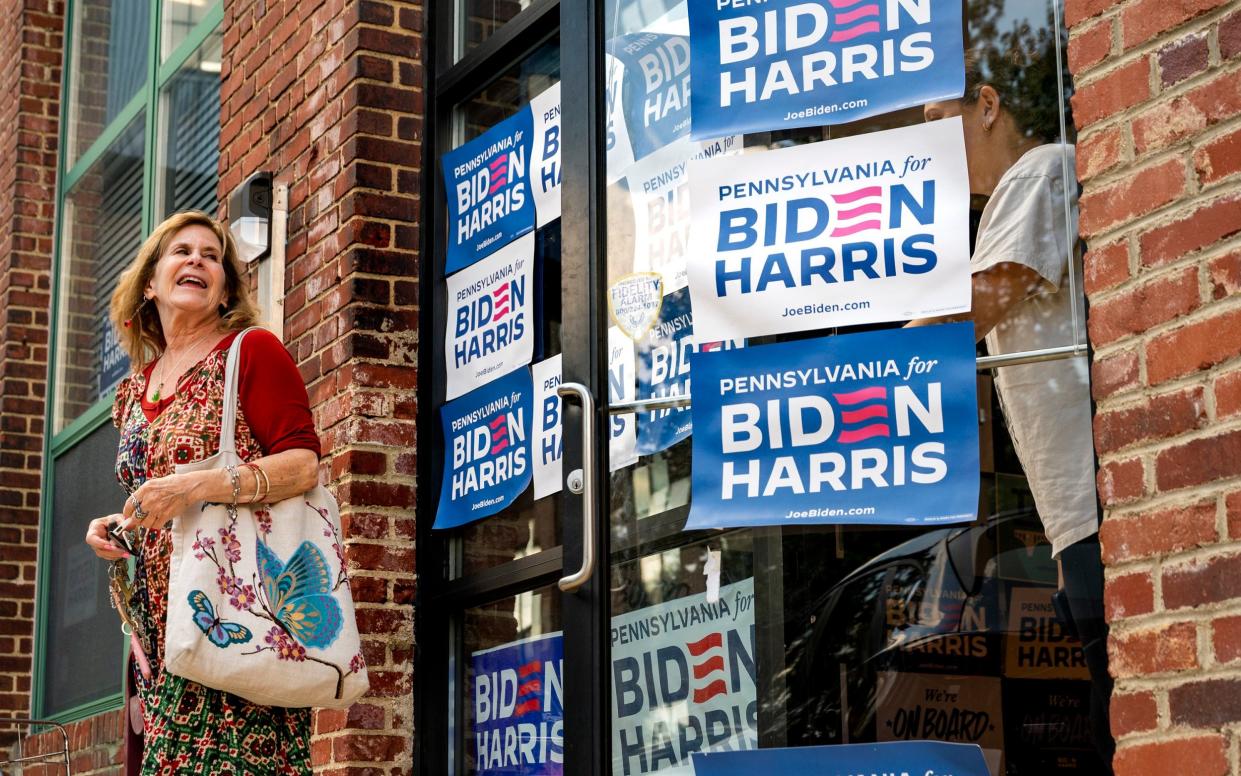 Dale Pearlstein, who lives nearby, stops by the Biden-Harris campaign office in Roxborough