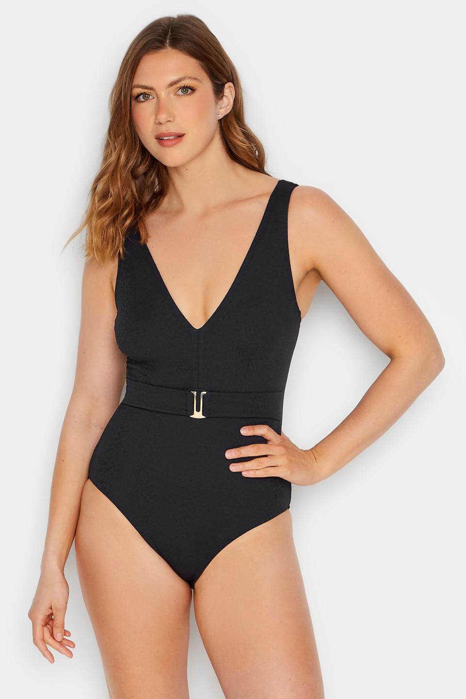 <p><a href="https://go.redirectingat.com?id=74968X1596630&url=https%3A%2F%2Fwww.longtallsally.com%2Flts-tall-black-textured-belt-swimsuit-p&sref=https%3A%2F%2Fwww.cosmopolitan.com%2Fstyle-beauty%2Ffashion%2Fg60191945%2Fbest-long-torso-swimsuits%2F" rel="nofollow noopener" target="_blank" data-ylk="slk:Shop Now;elm:context_link;itc:0;sec:content-canvas" class="link ">Shop Now</a></p><p>Black Textured Belt Swimsuit</p><p>Long Tall Sally</p><p>$39.99</p>