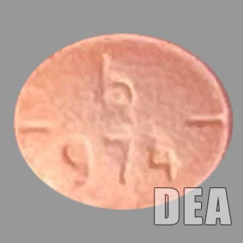 A counterfeit Adderall (stimulant) pill that U.S. Drug Enforcement agents seized. Counterfeit pills are often made or tainted with fentanyl, the agency says.