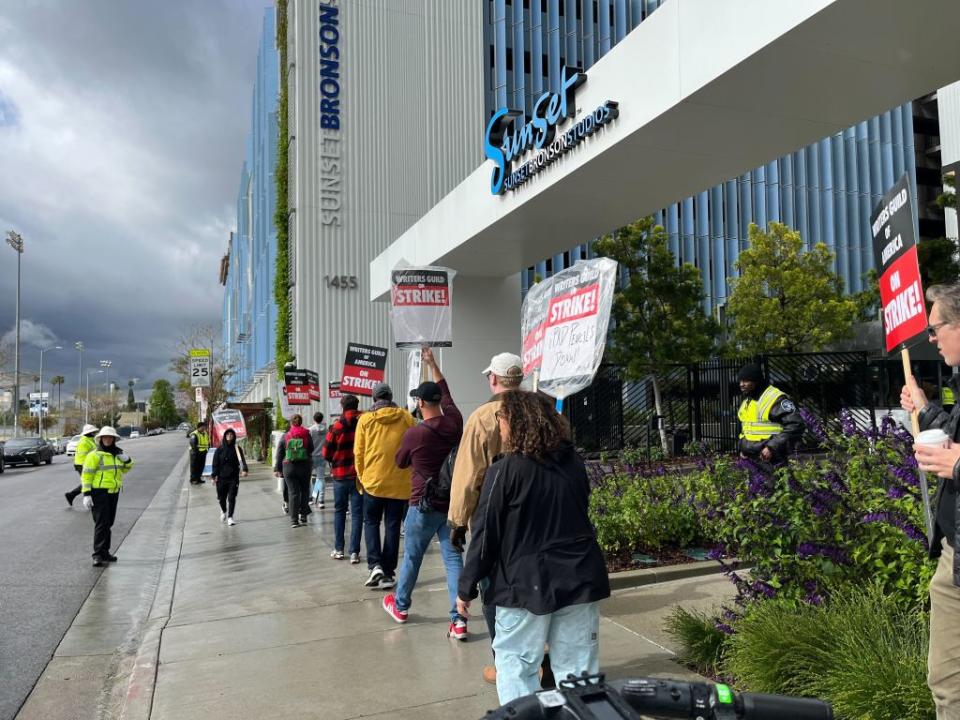 Striking writers picket outside Netflix’s Hollywood headquarters on May 4.