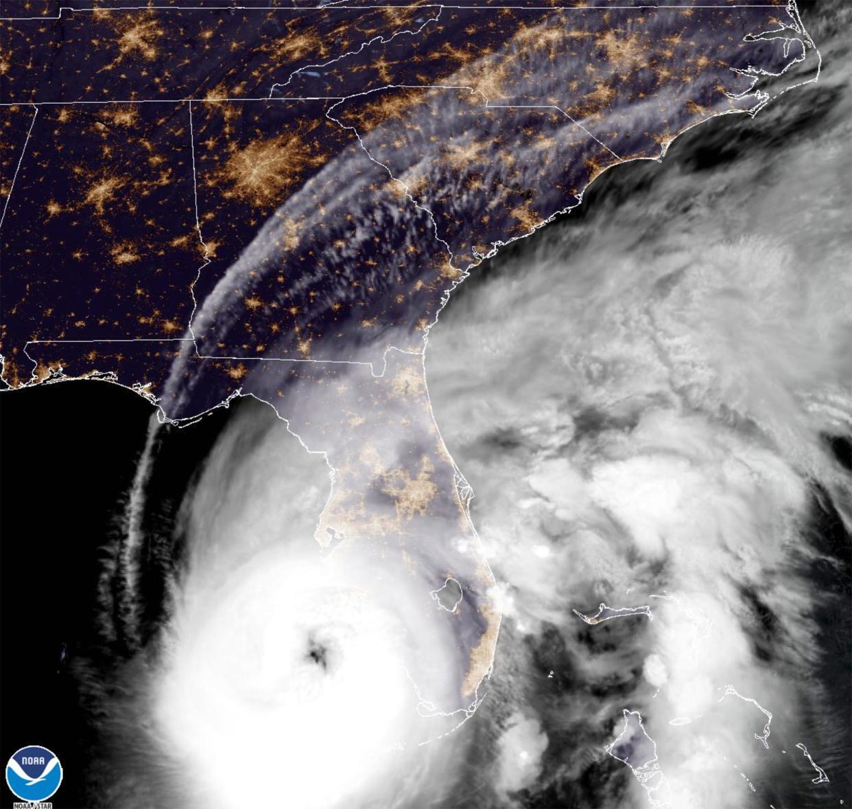 This satellite image provided by NOAA shows Hurricane Ian off Florida's southwest coast Wednesday, Sept. 28, 2022.